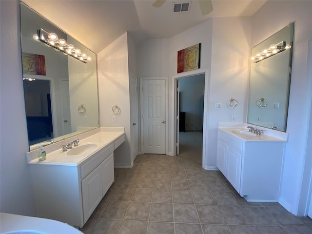 740 Bridgeport Ln, Prosper, TX 75078 - full bathroom featuring two vanities, tile patterned floors, ceiling fan, and lofted ceiling