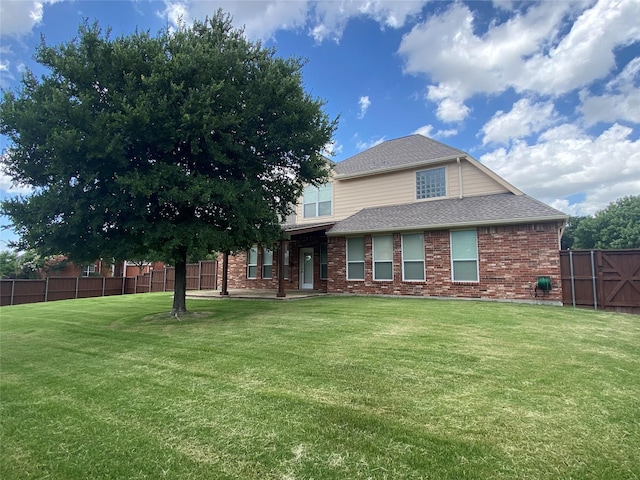 740 Bridgeport Ln, Prosper, TX 75078 - back of property with brick siding and roof with shingles