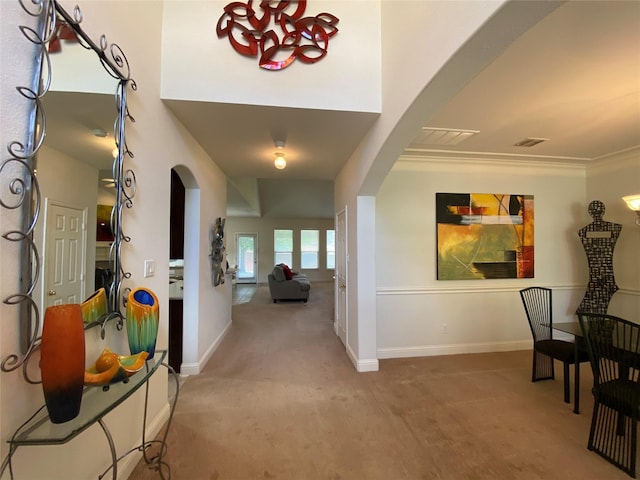 740 Bridgeport Ln, Prosper, TX 75078 - corridor with arched walkways, carpet floors, and crown molding