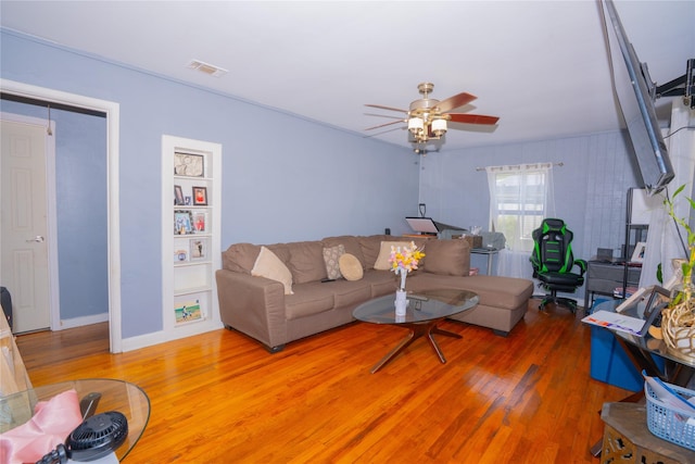 1443 Irene Ave, Lancaster, TX 75134 - living room with light wood finished floors and a ceiling fan