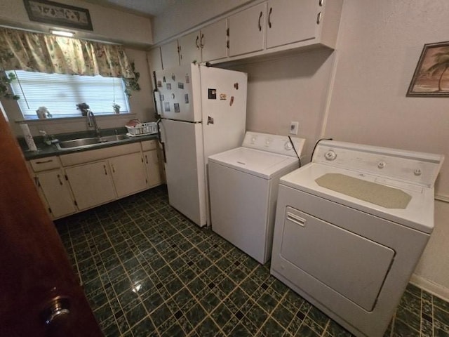 3916 Kushla Ave, Dallas, TX 75216 - laundry room with washer and clothes dryer