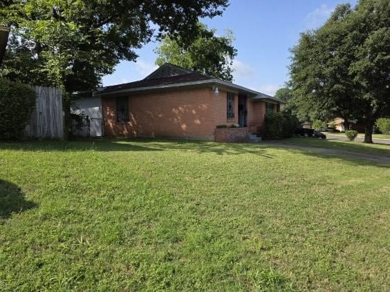 3916 Kushla Ave, Dallas, TX 75216 - view of side of home featuring brick siding
