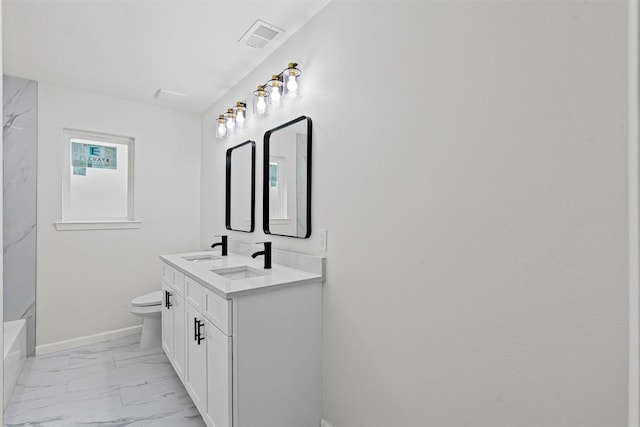 6401 Simmons Rd, North Richland Hills, TX 76182 - bathroom with marble look tile flooring and double vanity