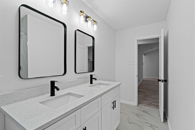 6401 Simmons Rd, North Richland Hills, TX 76182 - bathroom featuring marble finish floors and double vanity