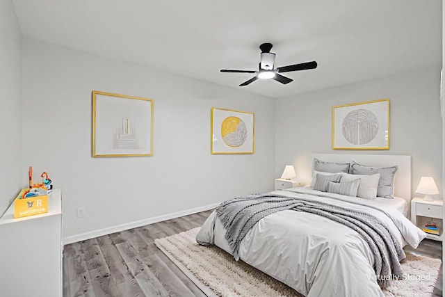 6401 Simmons Rd, North Richland Hills, TX 76182 - bedroom featuring wood finished floors and ceiling fan