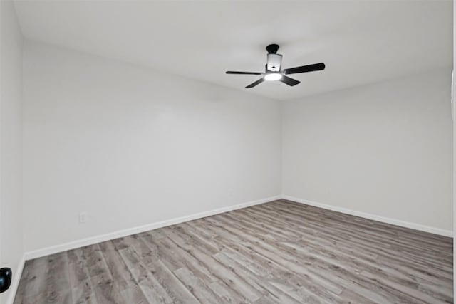 6401 Simmons Rd, North Richland Hills, TX 76182 - empty room featuring wood finished floors and a ceiling fan