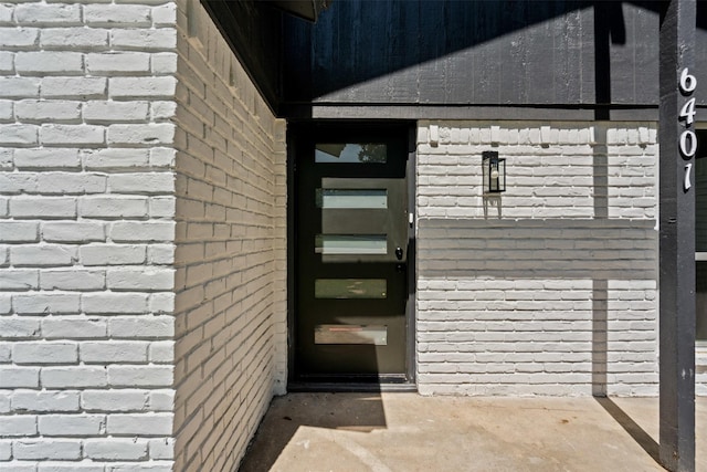 6401 Simmons Rd, North Richland Hills, TX 76182 - doorway to property with brick siding