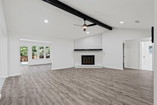 6401 Simmons Rd, North Richland Hills, TX 76182 - unfurnished living room with wood finished floors, ceiling fan, a fireplace, and recessed lighting