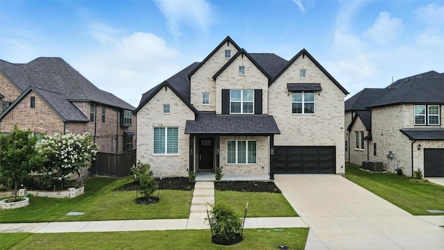 13868 Dorset Ln, Frisco, TX 75035 - view of front of house with an attached garage, brick siding, concrete driveway, and a front yard