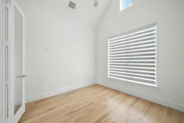 13868 Dorset Ln, Frisco, TX 75035 - empty room featuring high vaulted ceiling, a ceiling fan, and wood finished floors