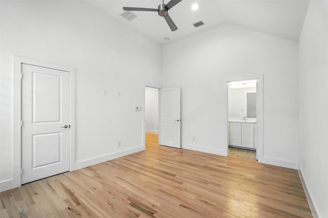 13868 Dorset Ln, Frisco, TX 75035 - unfurnished bedroom featuring high vaulted ceiling, light wood-type flooring, ensuite bathroom, and ceiling fan