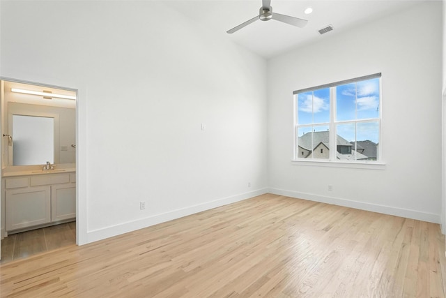 13868 Dorset Ln, Frisco, TX 75035 - unfurnished bedroom featuring light wood-style floors, ensuite bath, ceiling fan, and recessed lighting