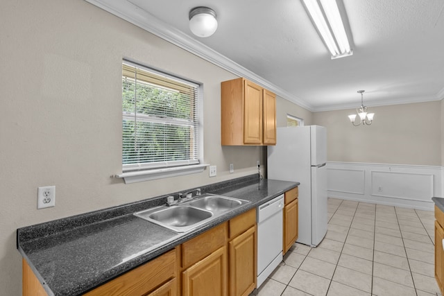 5308 Wentworth St, Fort Worth, TX 76132 - kitchen featuring white appliances, ornamental molding, dark countertops, a chandelier, and light tile patterned floors