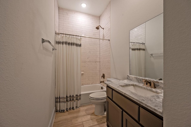 778 Corner Post Path, Celina, TX 75009 - bathroom featuring wood finished floors, vanity, shower / tub combo with curtain, and a textured wall