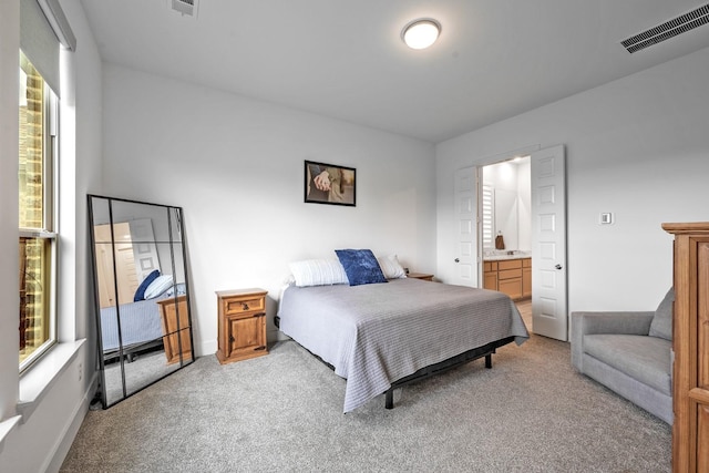 778 Corner Post Path, Celina, TX 75009 - bedroom featuring light carpet, multiple windows, and connected bathroom