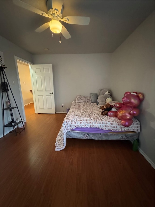 2100 Leandra Ln, Fort Worth, TX 76131 - bedroom with wood finished floors and a ceiling fan