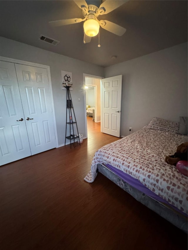 2100 Leandra Ln, Fort Worth, TX 76131 - bedroom featuring wood finished floors, a closet, and ceiling fan