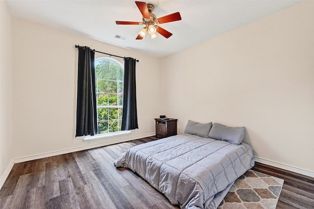 2107 Meadows Cir, Sherman, TX 75092 - bedroom featuring wood finished floors and ceiling fan