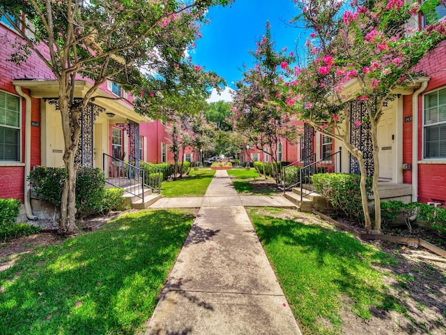 4814 Bradford Dr Unit 4814B, Dallas, TX 75219 - view of property's community featuring a lawn