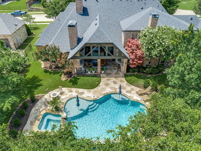 2521 Fair Oaks Ln, Prosper, TX 75078 - outdoor pool with a patio and a yard