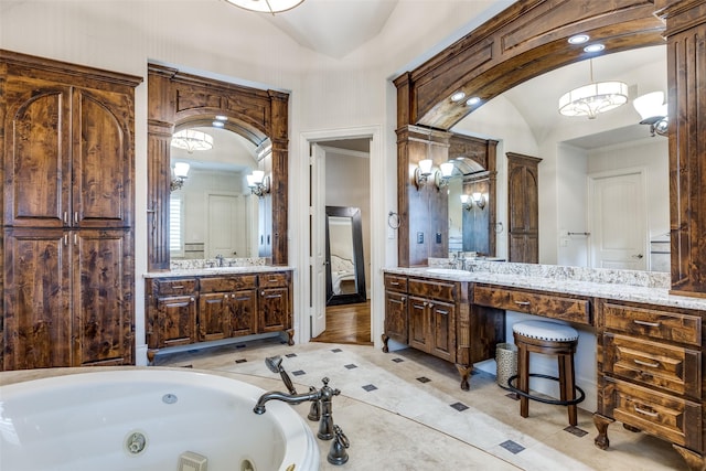 2521 Fair Oaks Ln, Prosper, TX 75078 - full bathroom with a tub with jets, vanity, a chandelier, and lofted ceiling
