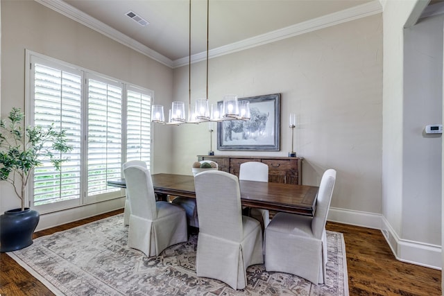 2521 Fair Oaks Ln, Prosper, TX 75078 - dining space featuring crown molding, wood finished floors, and a chandelier
