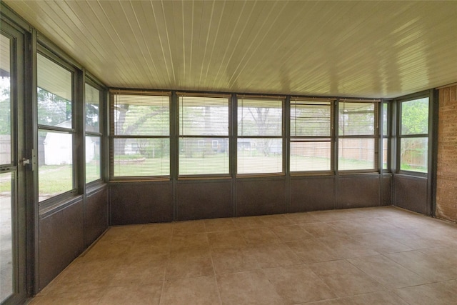 740 Willow St, Hurst, TX 76053 - unfurnished sunroom with wood ceiling and tile patterned floors