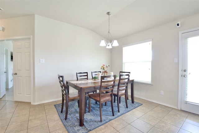 9929 Caney Creek Dr, Waco, TX 76708 - dining room with a chandelier, light tile patterned floors, and vaulted ceiling