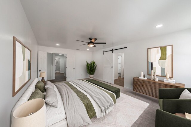 3509 Brook Glen Dr, Garland, TX 75044 - bedroom with a barn door, recessed lighting, and ceiling fan
