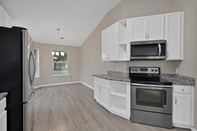8805 Highland Orchard Dr, Fort Worth, TX 76179 - kitchen with appliances with stainless steel finishes, vaulted ceiling, and white cabinetry