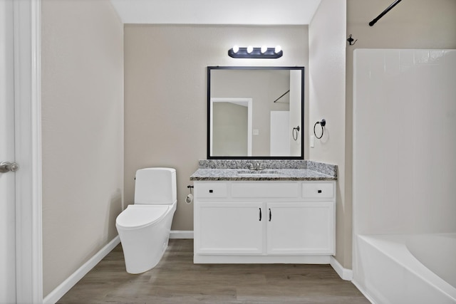 8805 Highland Orchard Dr, Fort Worth, TX 76179 - bathroom featuring vanity, wood finished floors, and shower / bathtub combination