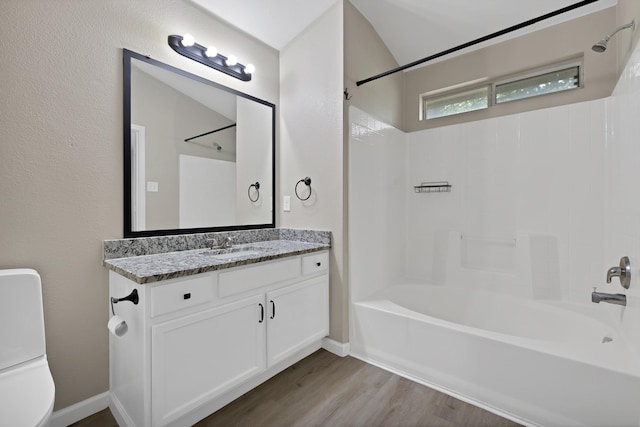 8805 Highland Orchard Dr, Fort Worth, TX 76179 - bathroom featuring washtub / shower combination, vanity, and wood finished floors