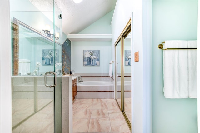 3104 Park Garden Pl, Richardson, TX 75082 - bathroom with vaulted ceiling, a garden tub, a stall shower, marble finish flooring, and a textured ceiling