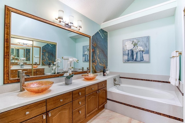 3104 Park Garden Pl, Richardson, TX 75082 - full bath with a bath, double vanity, tile patterned floors, lofted ceiling, and a textured ceiling