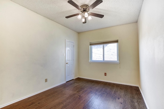 3104 Park Garden Pl, Richardson, TX 75082 - unfurnished room with dark wood-style floors, a ceiling fan, and a textured ceiling