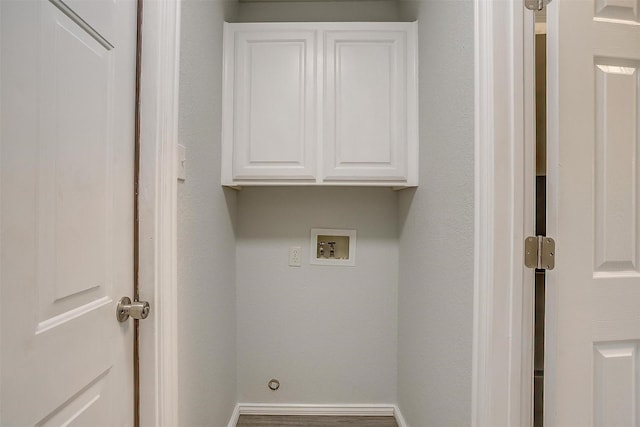 692 High Crest Dr, Azle, TX 76020 - laundry area with cabinet space and washer hookup