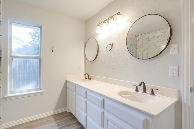 692 High Crest Dr, Azle, TX 76020 - full bathroom with double vanity and wood finished floors