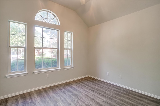 692 High Crest Dr, Azle, TX 76020 - empty room with dark wood-style floors, lofted ceiling, and a ceiling fan
