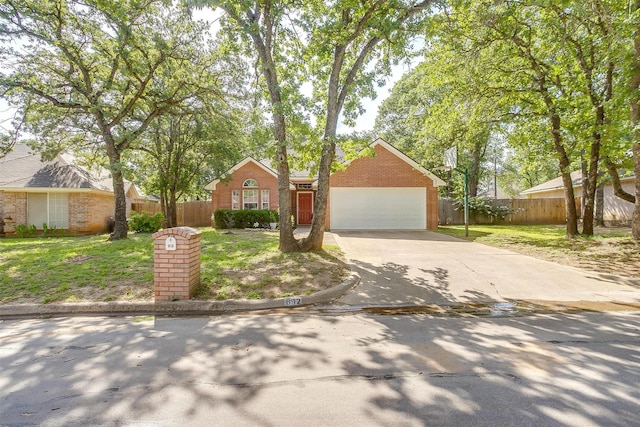 692 High Crest Dr, Azle, TX 76020 - view of front of property featuring brick siding, driveway, and a garage