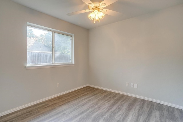 692 High Crest Dr, Azle, TX 76020 - empty room featuring wood finished floors and ceiling fan
