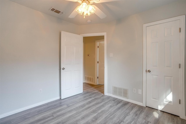 692 High Crest Dr, Azle, TX 76020 - unfurnished bedroom with light wood-style floors and a ceiling fan