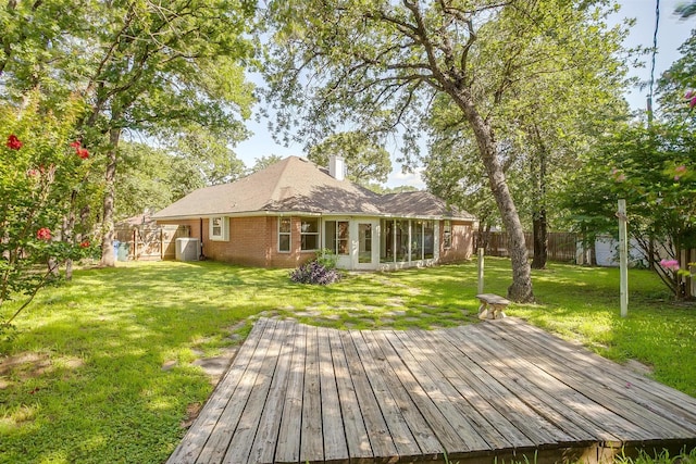 692 High Crest Dr, Azle, TX 76020 - wooden deck with a fenced backyard and a sunroom