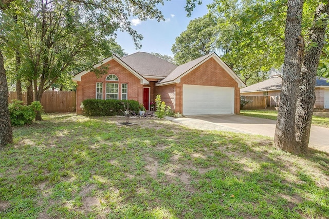 692 High Crest Dr, Azle, TX 76020 - view of front of property with brick siding, an attached garage, and concrete driveway