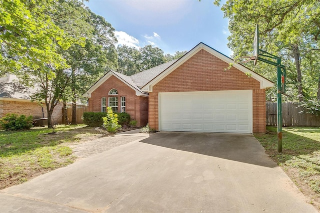 692 High Crest Dr, Azle, TX 76020 - view of front of house featuring brick siding, an attached garage, and driveway