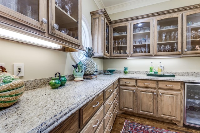 5930 Desco Dr, Dallas, TX 75225 - bar area featuring wine cooler, ornamental molding, and dark wood-type flooring