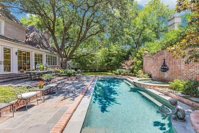 5930 Desco Dr, Dallas, TX 75225 - view of swimming pool with a patio area, a fenced backyard, and a pool with connected hot tub