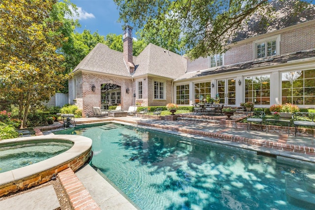 5930 Desco Dr, Dallas, TX 75225 - view of pool with a patio and a pool with connected hot tub