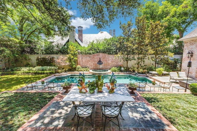 5930 Desco Dr, Dallas, TX 75225 - fenced backyard featuring a patio