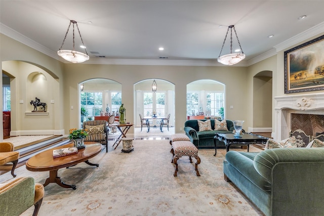 5930 Desco Dr, Dallas, TX 75225 - living area with ornamental molding, arched walkways, plenty of natural light, and a fireplace