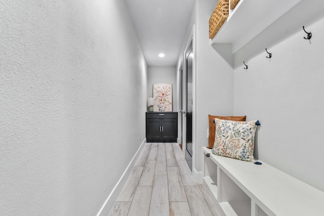521 Echo Glade Ct, Azle, TX 76020 - mudroom with light wood-style floors and baseboards